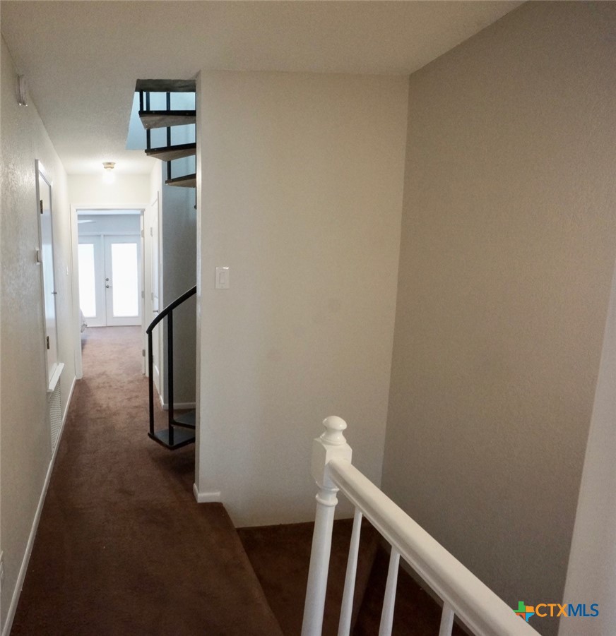 520 15th Street Port O'Connor, TX 77982 - Photo 28 of 36 a view of hallway with stairs