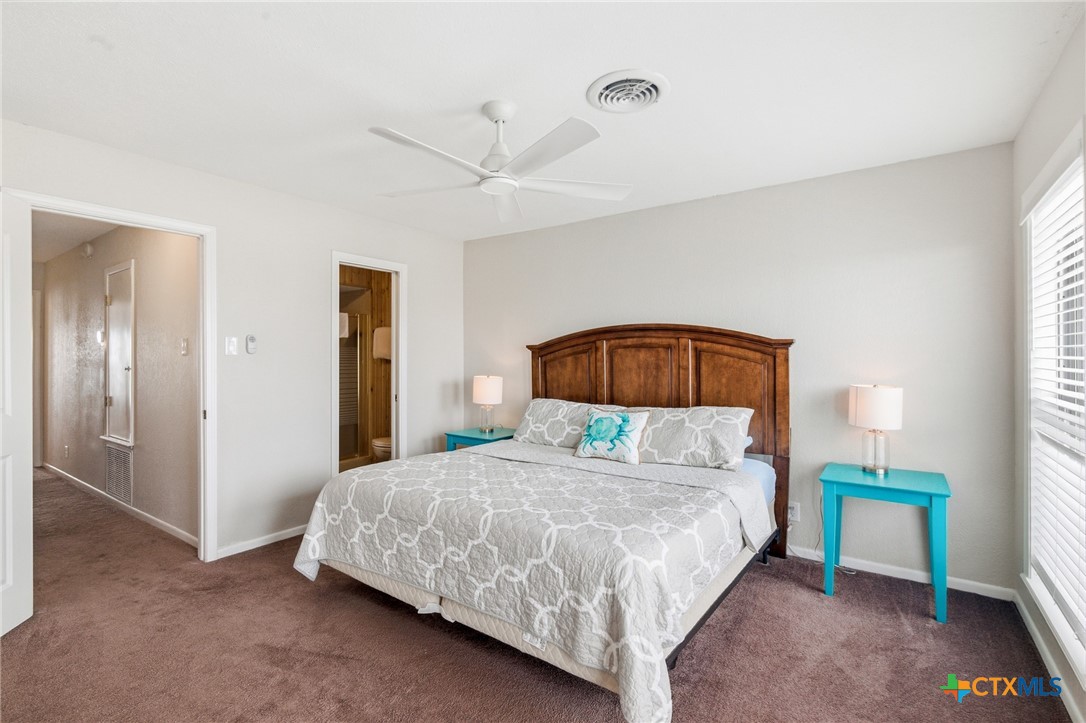 520 15th Street Port O'Connor, TX 77982 - Photo 29 of 36 a bedroom with a bed and a closet