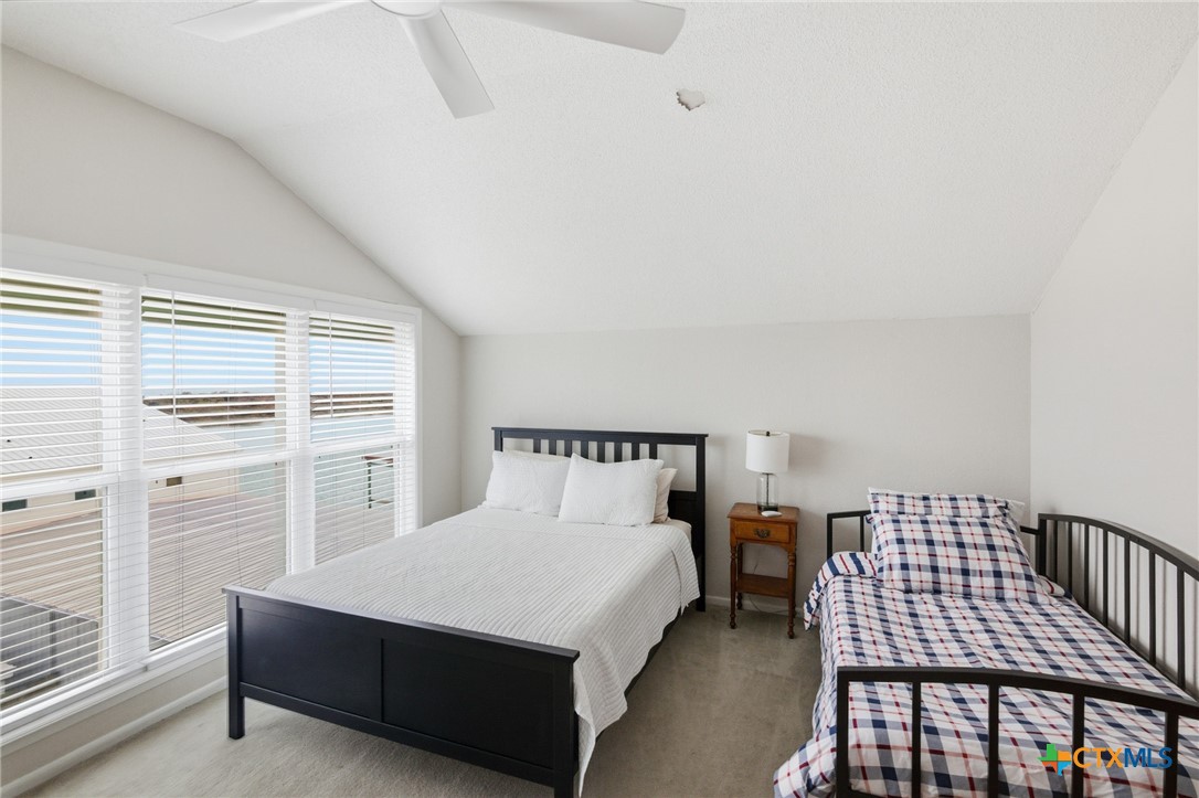 520 15th Street Port O'Connor, TX 77982 - Photo 36 of 36 a bedroom with a bed and window