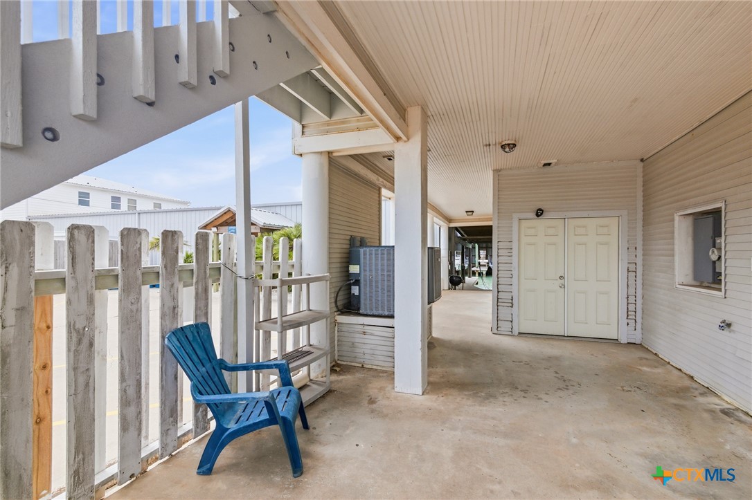 520 15th Street Port O'Connor, TX 77982 - Photo 5 of 36 a view of a patio with table and chairs