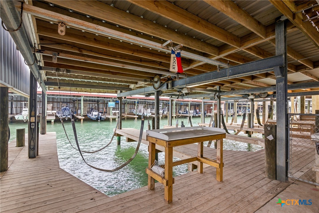 520 15th Street Port O'Connor, TX 77982 - Photo 8 of 36 a view of a chairs and table on the deck