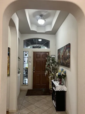a view of a hallway with workspace and a hallway