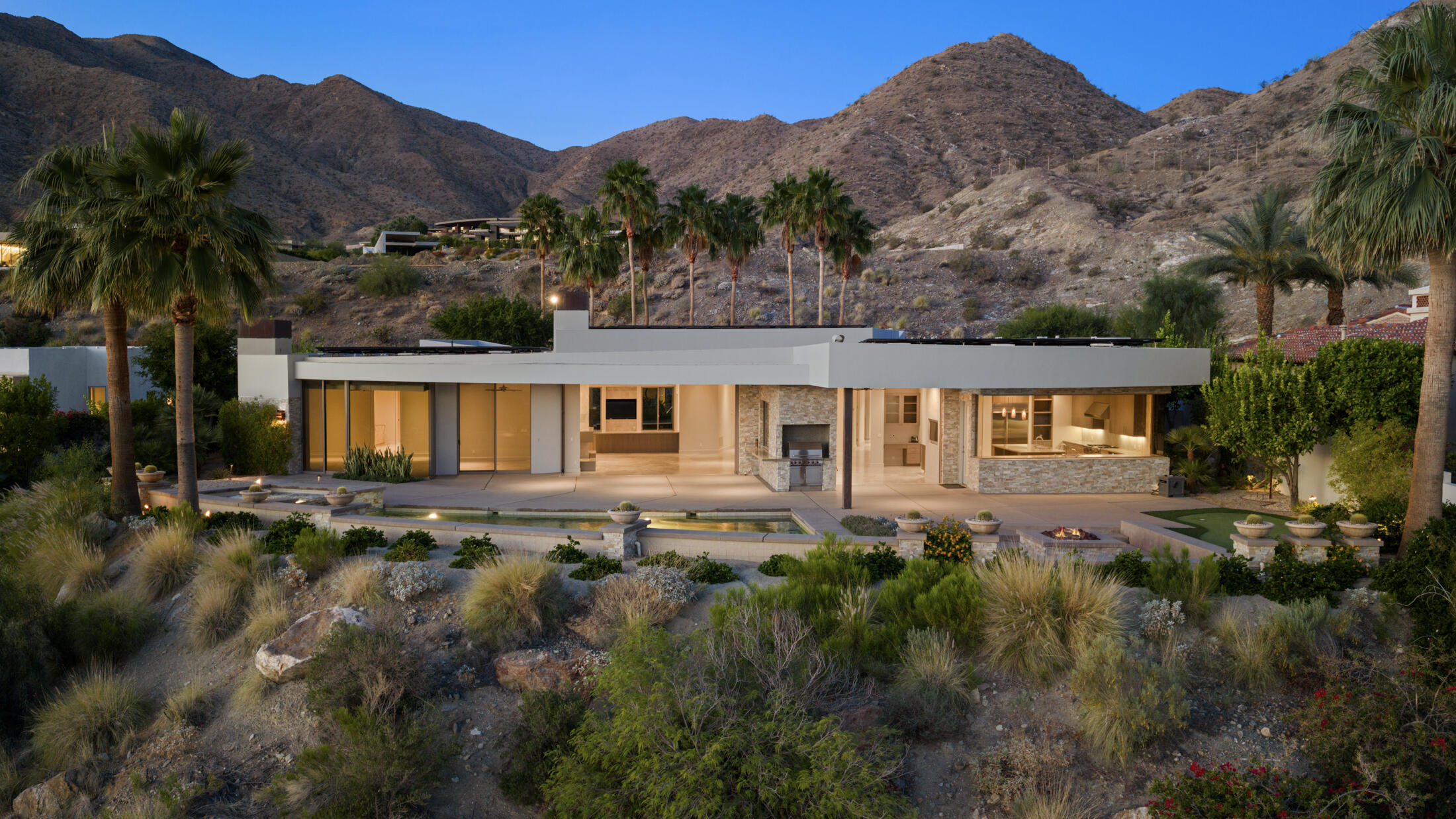 30 Hillcrest Drive Rancho Mirage, CA 92270 - Photo 15 of 79 a view of a house with a yard and a large tree