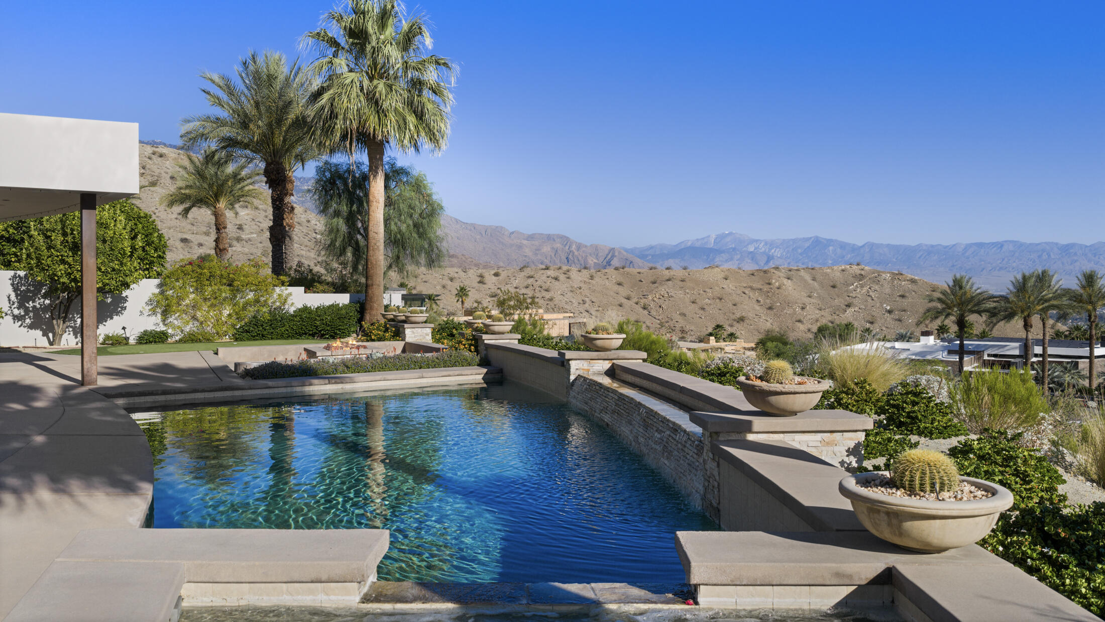 30 Hillcrest Drive Rancho Mirage, CA 92270 - Photo 3 of 79 a view of a lake with couches and city view