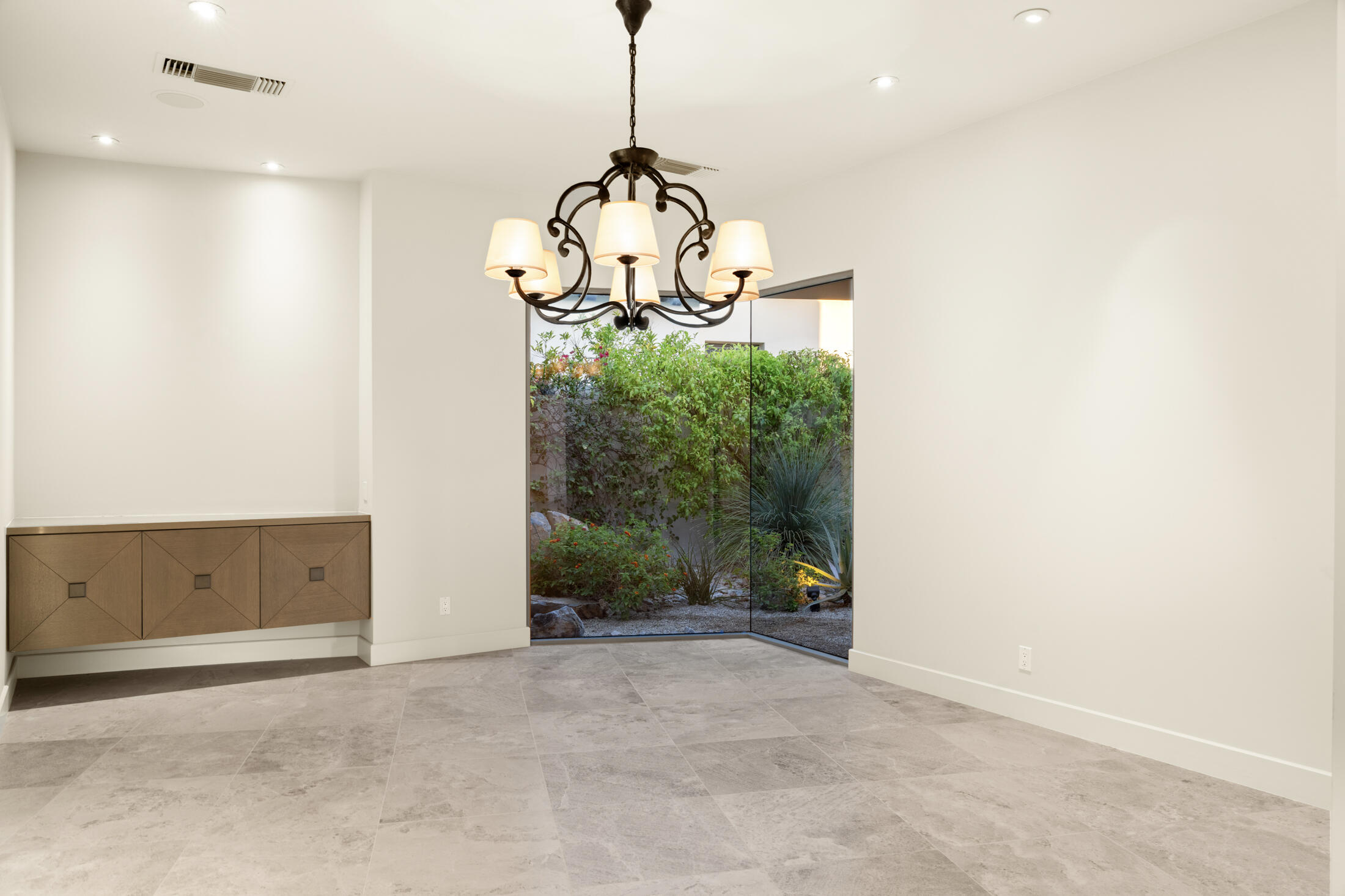30 Hillcrest Drive Rancho Mirage, CA 92270 - Photo 35 of 79 a view of a chandelier and window in a room