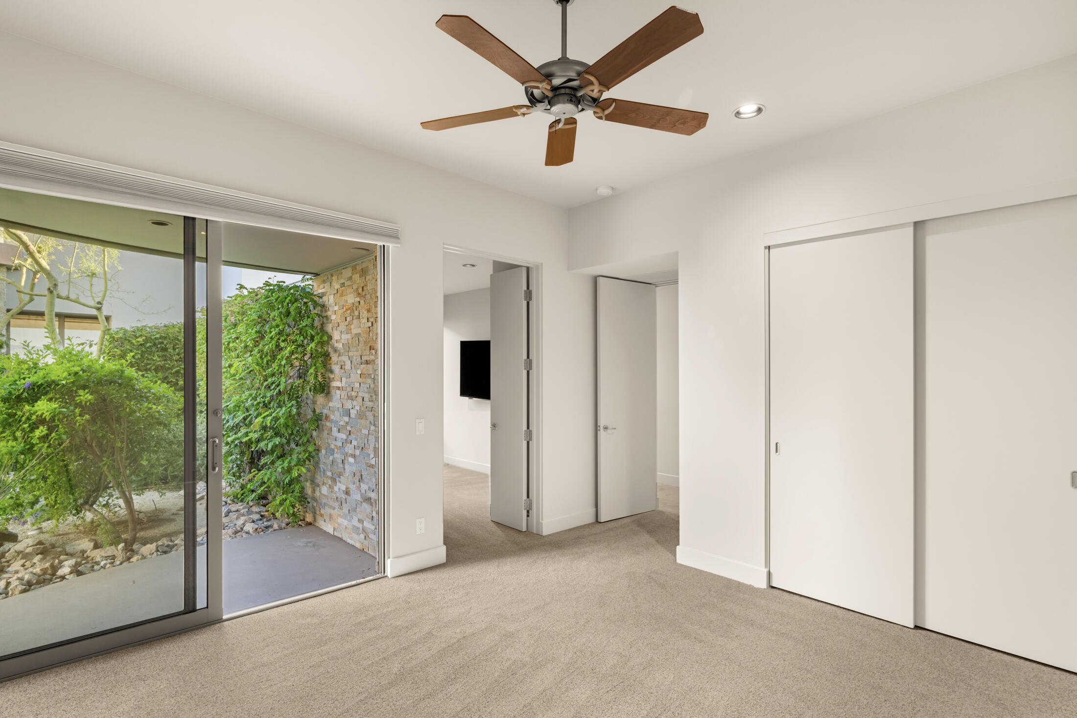 30 Hillcrest Drive Rancho Mirage, CA 92270 - Photo 42 of 79 a view of a livingroom with a ceiling fan and window