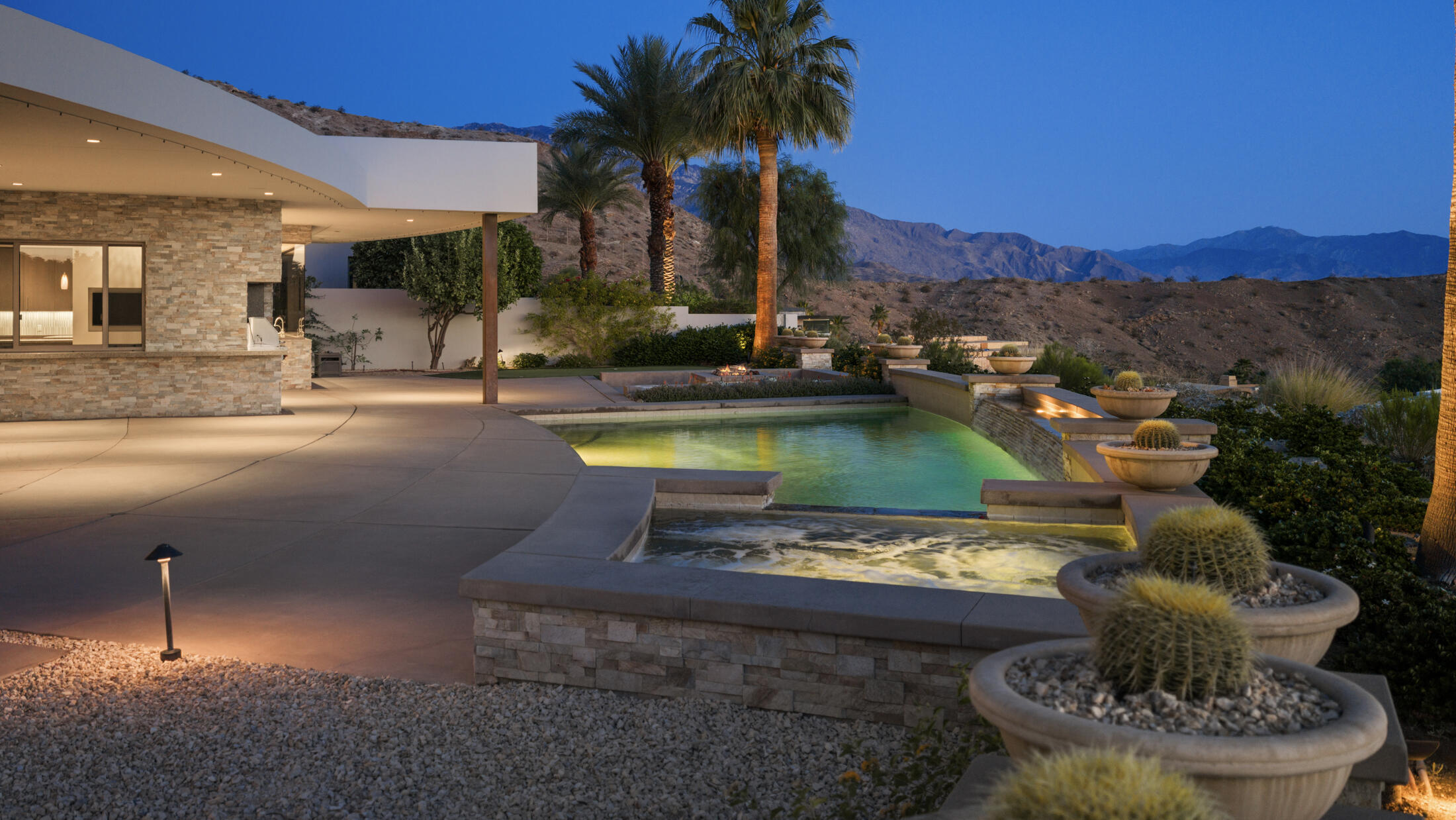 30 Hillcrest Drive Rancho Mirage, CA 92270 - Photo 67 of 79 a view of a swimming pool with a patio