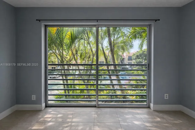 a view of a room with a large window