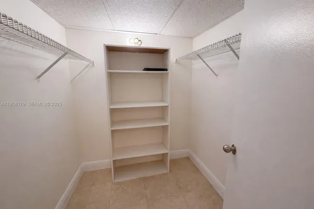 a kitchen that has a cabinets and a stove