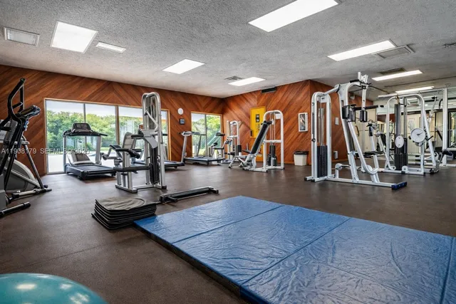 a front view of a house with a yard table and chairs