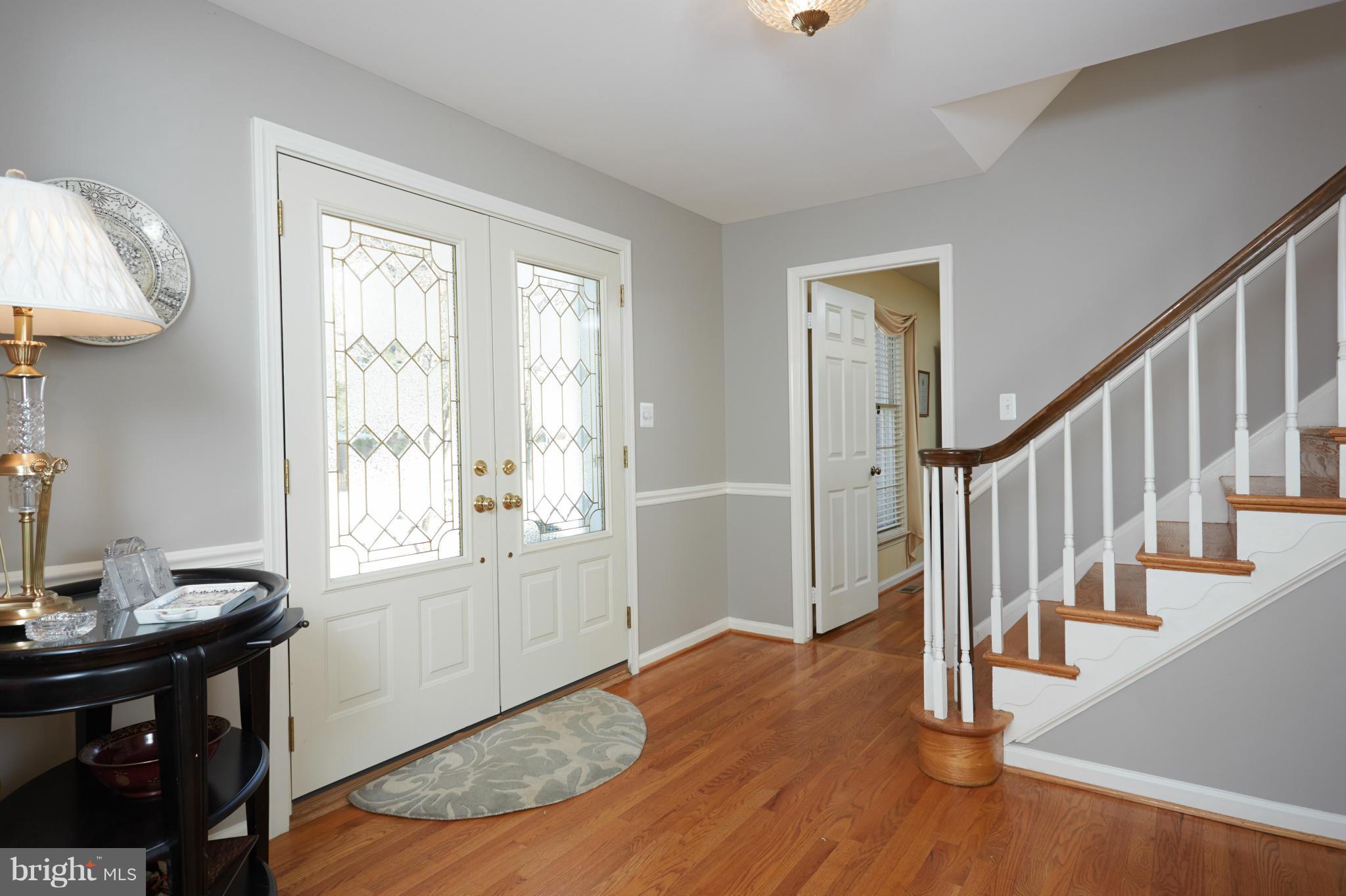 9430 Reach Road Potomac, MD 20854 - Photo 10 of 29 New double doors grace the entrance and foyer