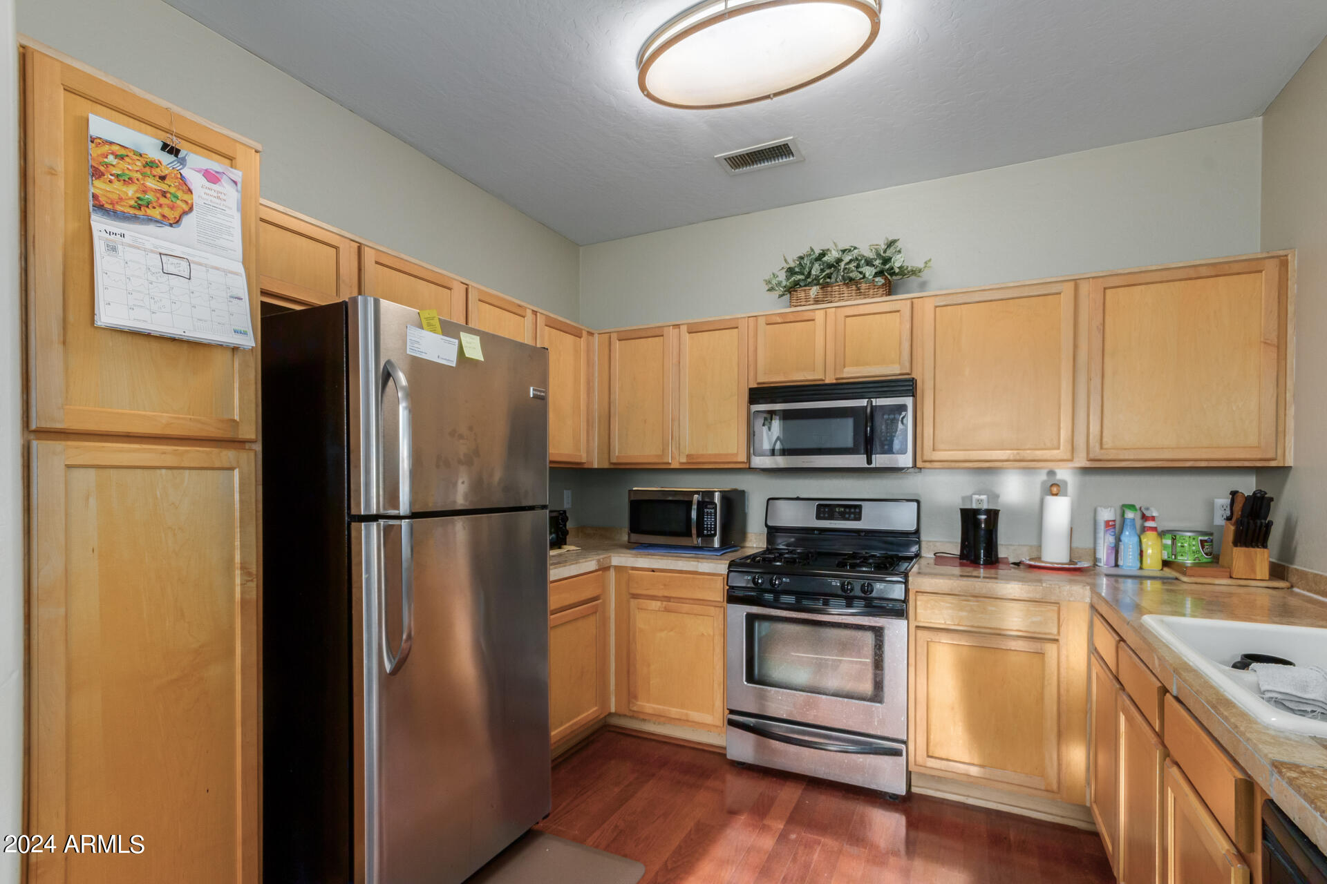 11199 West Berkeley Road Avondale, AZ 85392 - Photo 11 of 28 Kitchen includes SS fridge