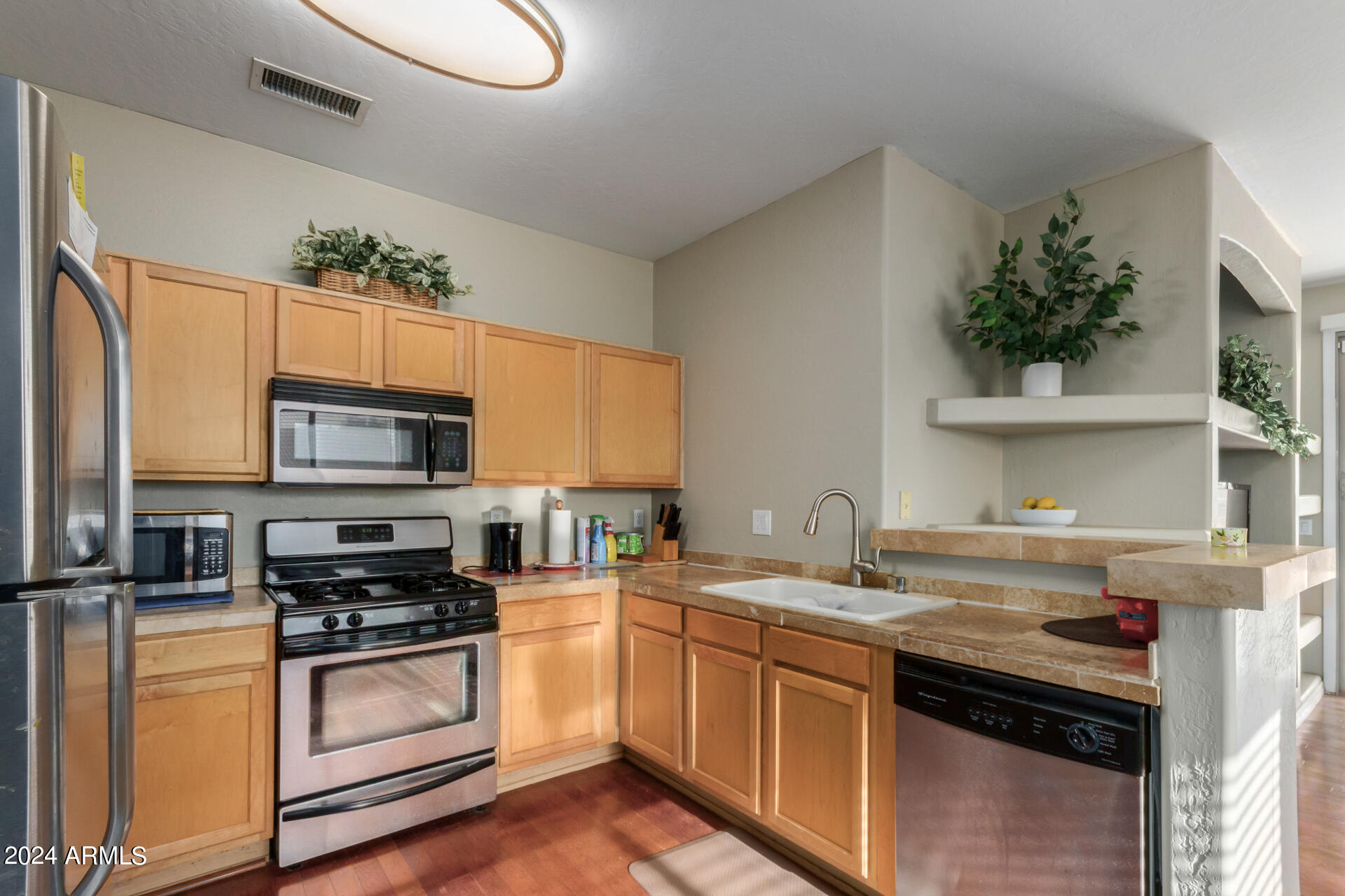 11199 West Berkeley Road Avondale, AZ 85392 - Photo 10 of 28 Kitchen has SS appliances