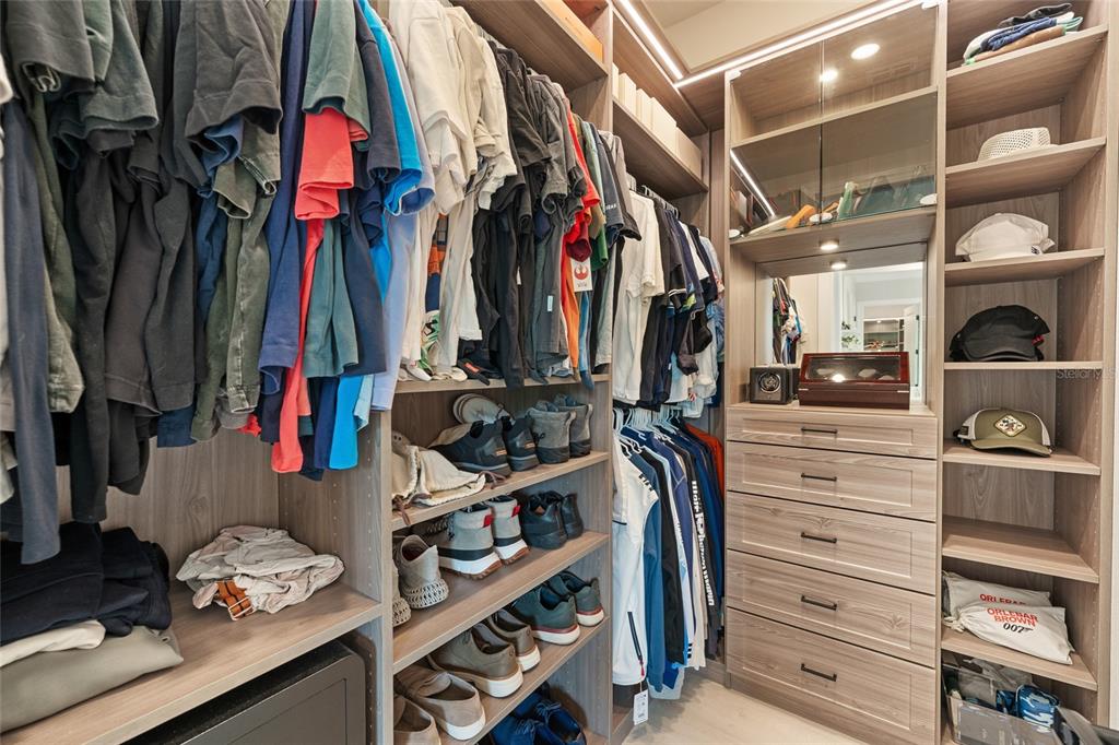 10175 Brocksport Circle Gotha, FL 34734 - Photo 24 of 54 a view of walk in closet with clothes and shoes
