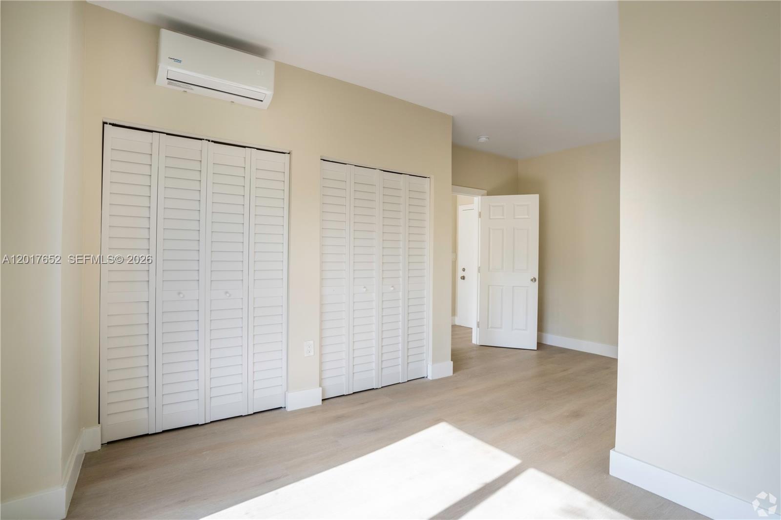 433 Southwest 6th Street, Unit 15 Miami, FL 33130 - Photo 6 of 12 an empty room with closet