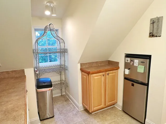 a bathroom with a sink toilet and mirror