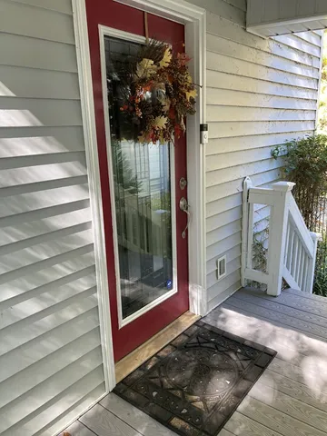 a view of a entryway door of house