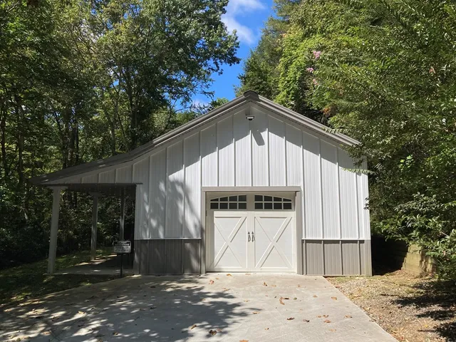 a view of a trees with a yard