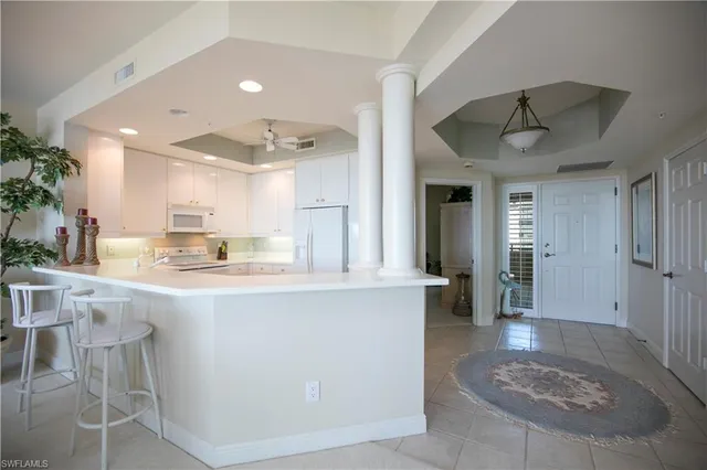 $7,800 | 430 Cove Tower Drive, Unit 1202, Naples, FL 34110