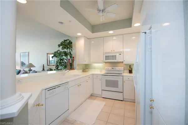 $7,800 | 430 Cove Tower Drive, Unit 1202, Naples, FL 34110