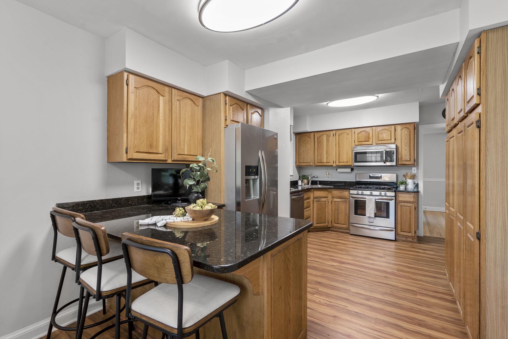 9911 Renfrew Road Silver Spring, MD 20901 - Photo 14 of 49 Expansive kitchen with SS appliances