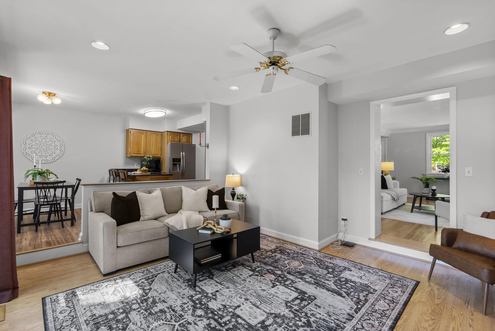 9911 Renfrew Road Silver Spring, MD 20901 - Photo 7 of 49 Family Room with vinyl floors and ceiling fan