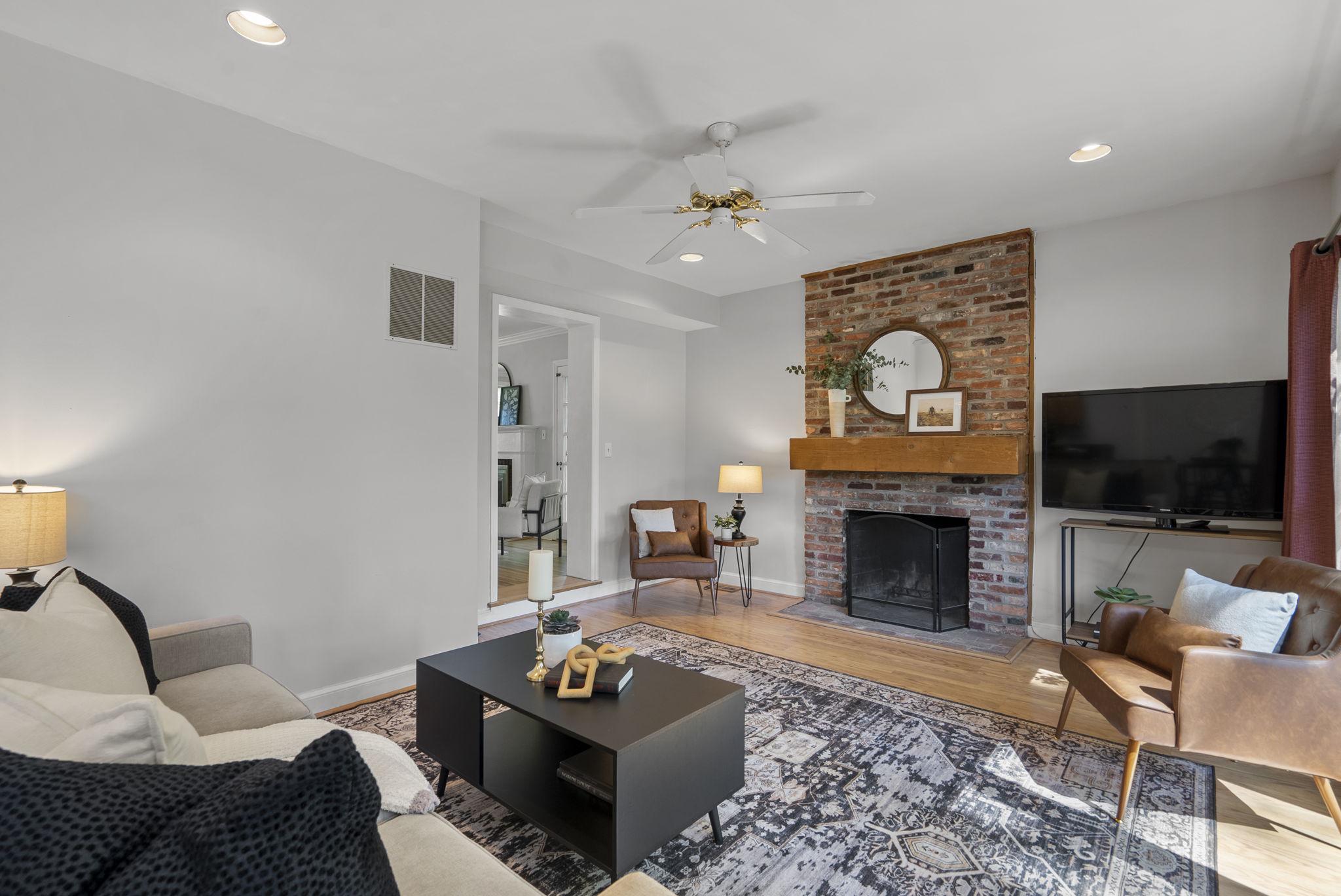9911 Renfrew Road Silver Spring, MD 20901 - Photo 9 of 49 Family room with 2nd wood burning fireplace
