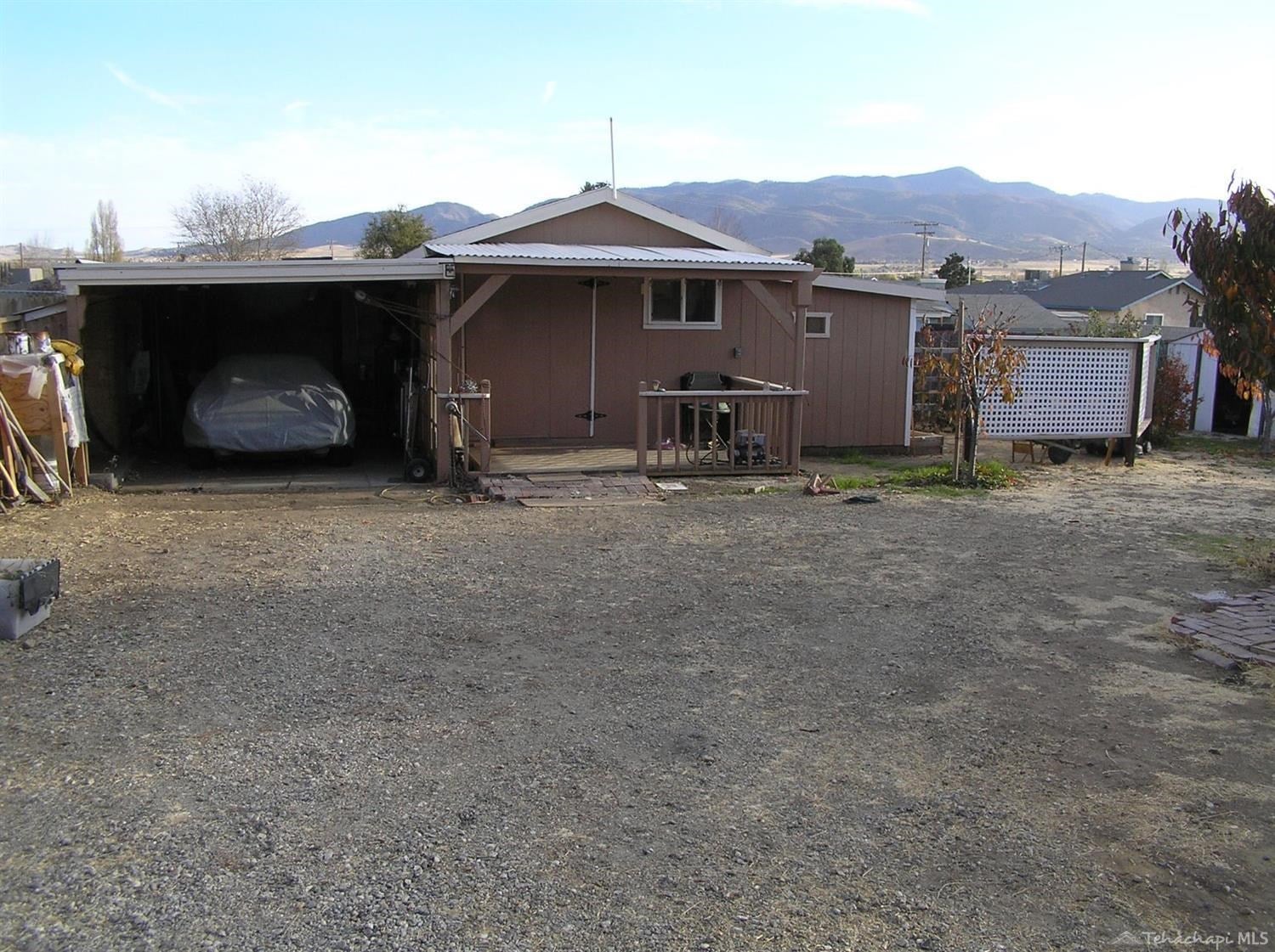 19900 Meadows Road Tehachapi, CA 93561 - Photo 31 of 42 Workshop with 1 car carport