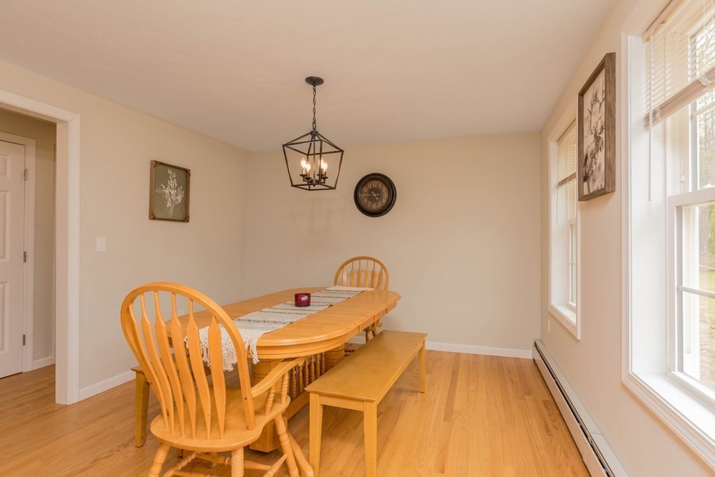 20 Jewett Hill Road Ashby, MA 01431 - Photo 4 of 14 a dining room with a table and chairs