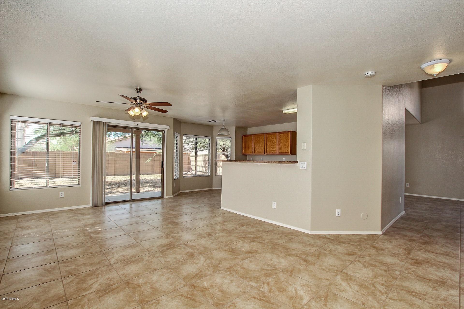 6451 West Crown King Road Phoenix, AZ 85043 - Photo 13 of 34 Great Room to Kitchen