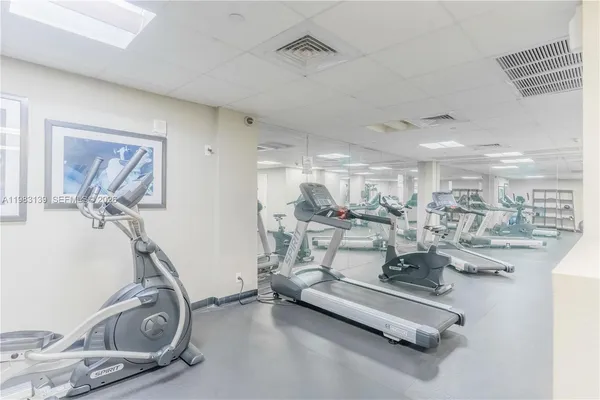 a view of a room with gym equipment