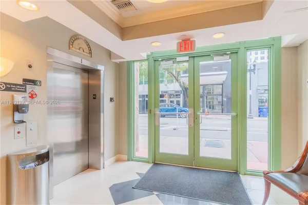 a view of a hallway with entryway