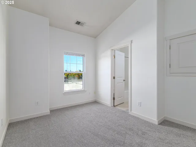 a view of an empty room with window