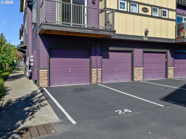 a front view of a building with a street