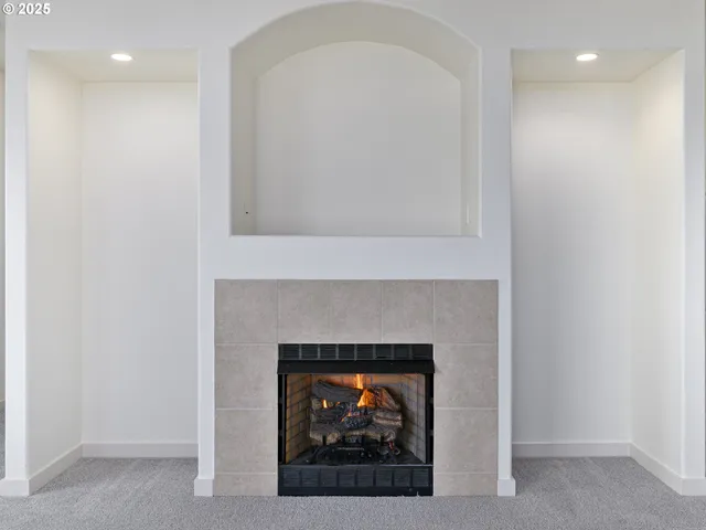 a living room with a fireplace