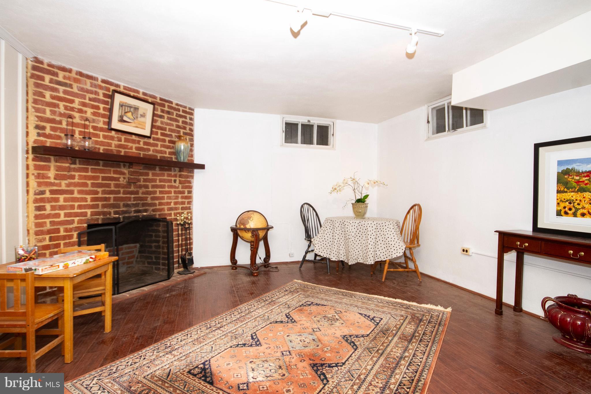 107 Taplow Road Baltimore, MD 21212 - Photo 28 of 30 Clubroom with fireplace.