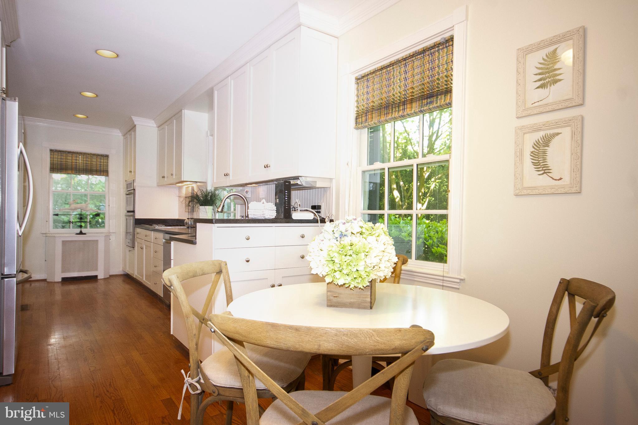 107 Taplow Road Baltimore, MD 21212 - Photo 8 of 30 Eat-in Kitchen with hardwood floors.