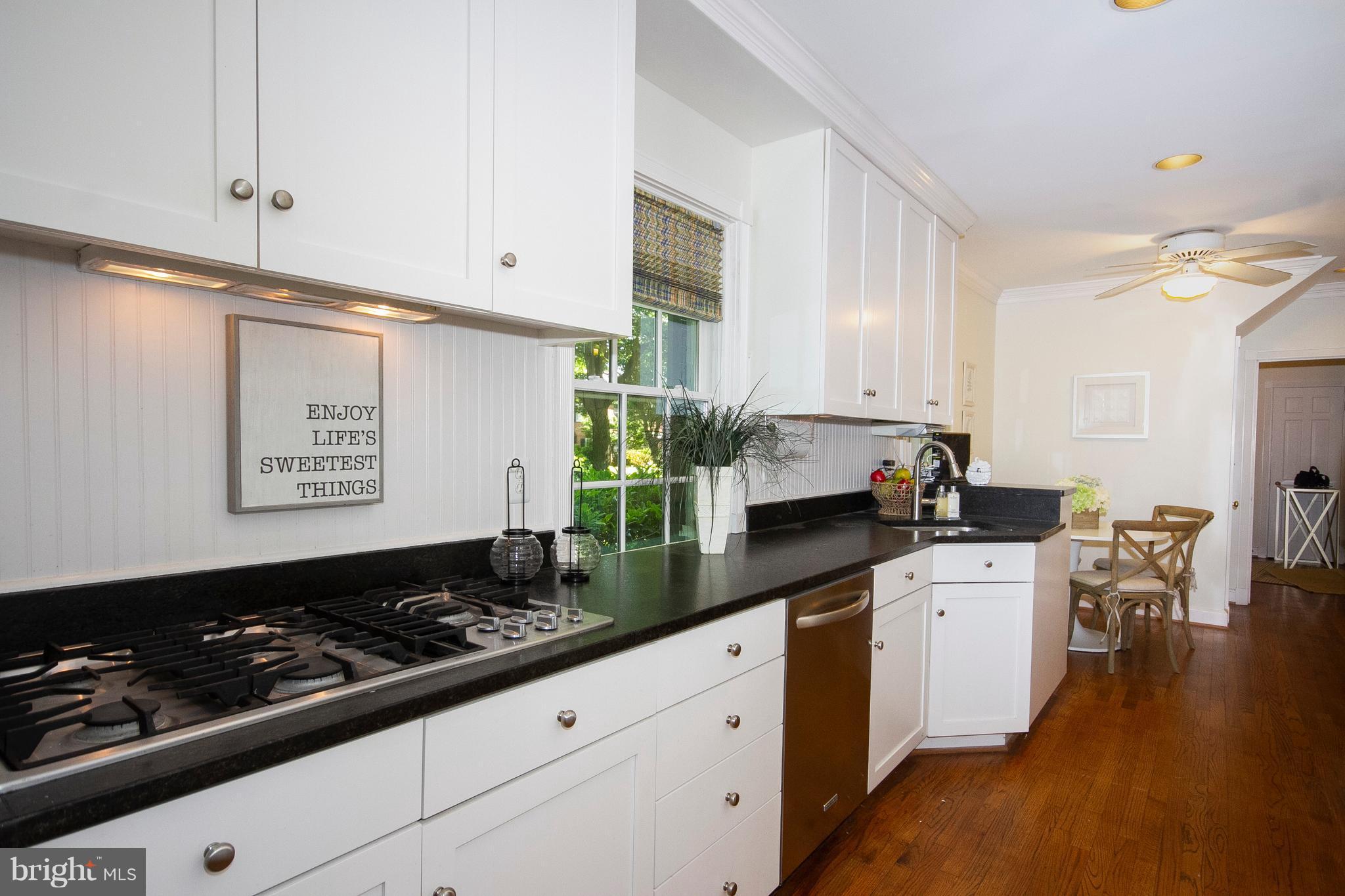 107 Taplow Road Baltimore, MD 21212 - Photo 10 of 30 Gas cooktop, stainless appliances, pantry.