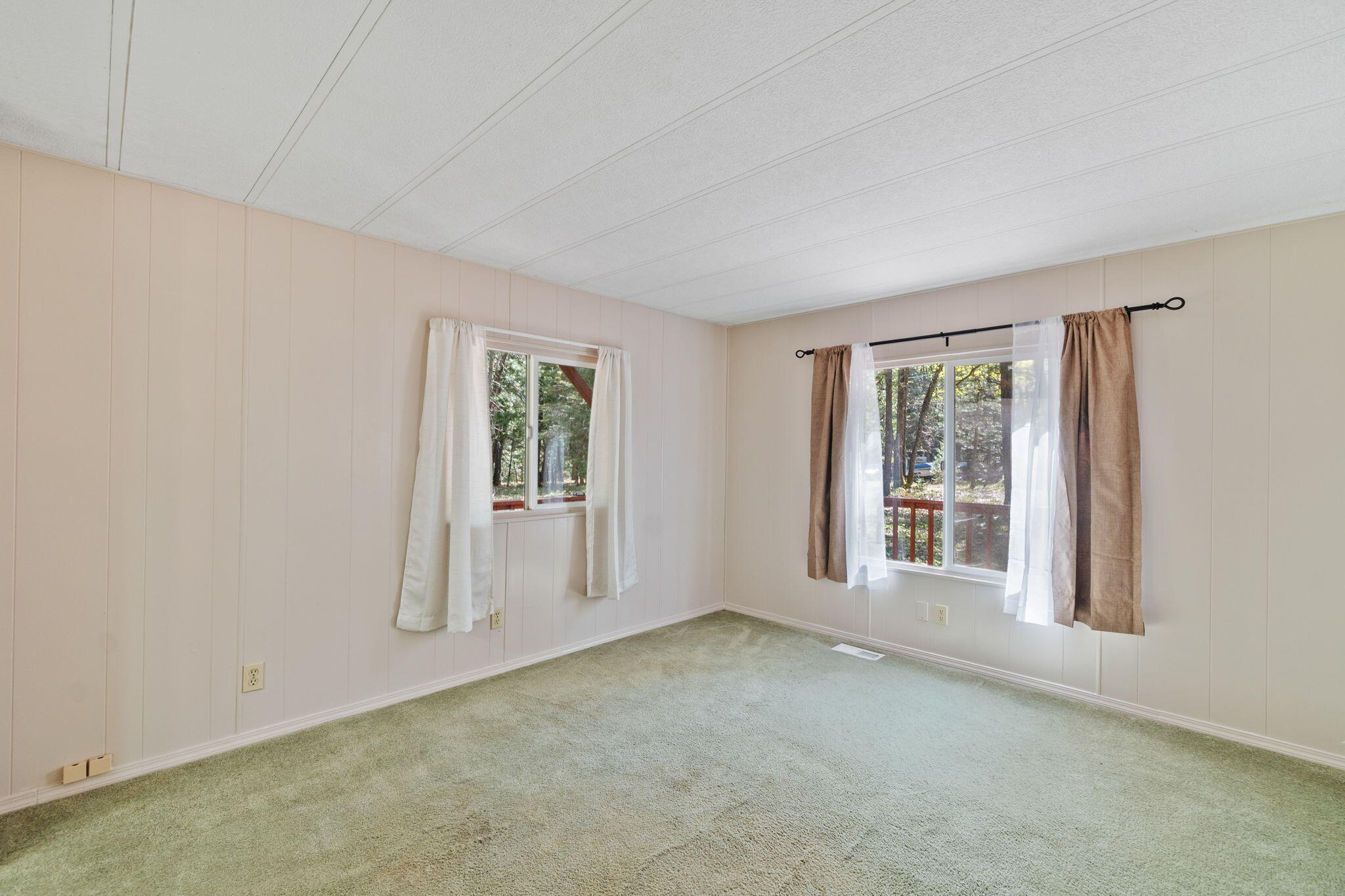 7517 Brett Road Shingletown, CA 96088 - Photo 3 of 26 an empty room with windows