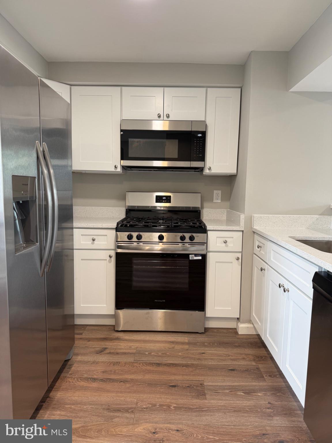 2908 Mallview Road Baltimore, MD 21230 - Photo 7 of 22 a kitchen with stainless steel appliances a stove and a refrigerator