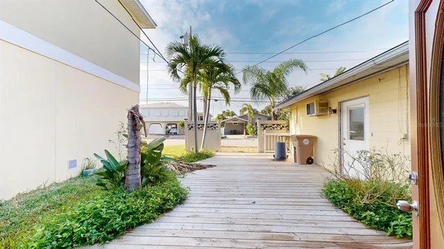 a view of a yard with cars
