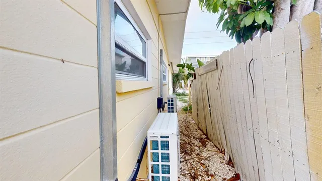 a utility room with cabinets washer and dryer