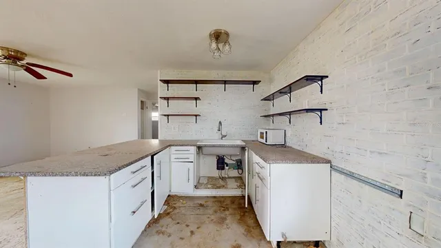 a view of an empty room and window