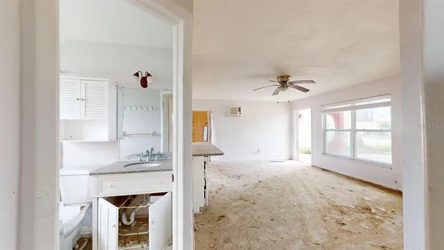 a view of an empty room and window