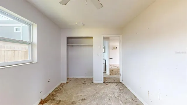 a view of a room with white walls