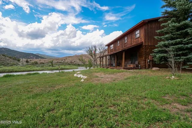 a view of a lake from a garden