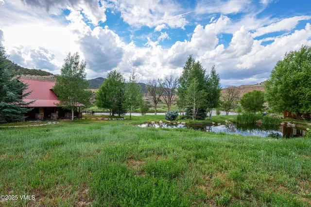 a view of a two chairs in patio