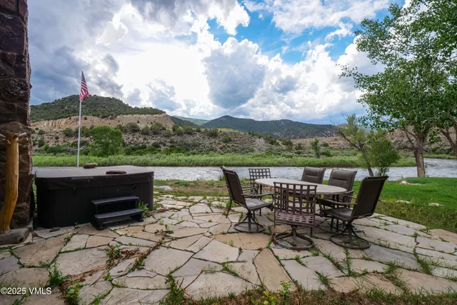 a view of a street with a park