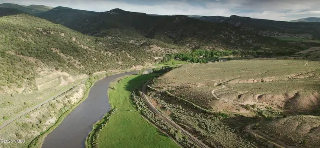 a view of a lake with a mountain