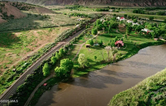 a view of a pathway with a park